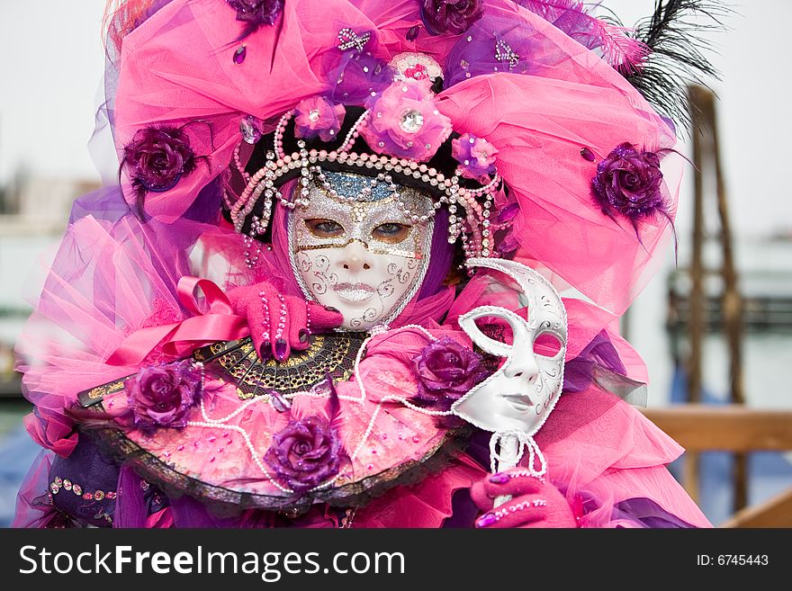 Pink costume at the Venice Carnival. Pink costume at the Venice Carnival