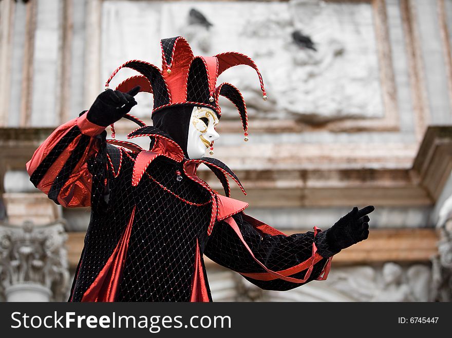 Red and black costume at the Venice Carnival. Red and black costume at the Venice Carnival