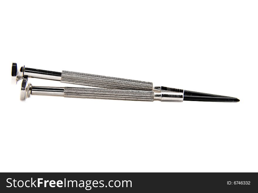 Two cross screw drivers on white isolated background. Two cross screw drivers on white isolated background