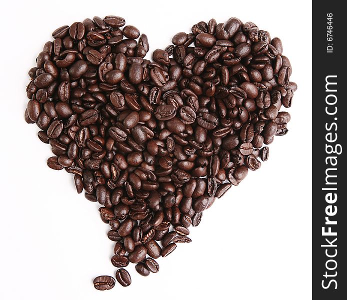 A heart made of coffee crops. Isolated on white background. A heart made of coffee crops. Isolated on white background