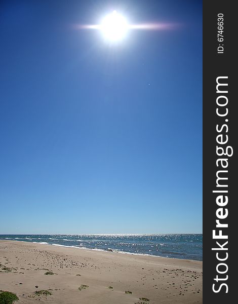 Sun in the sea beach in Europe