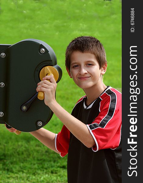 Teenager working  out in the park