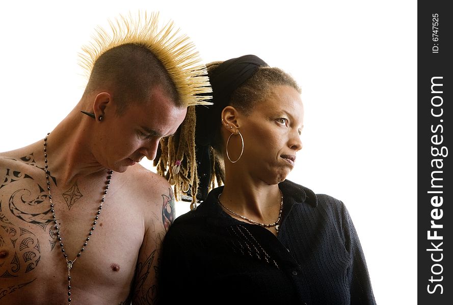 Man with Mohawk and Woman wearing Dreadlocks. Man with Mohawk and Woman wearing Dreadlocks