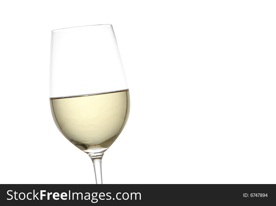 A glass of white wine in the studio