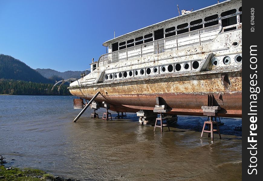 Old Boat Obsolete On Lake