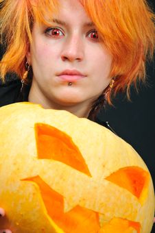 Red-hair Witch With Pumkin Stock Images Red-hair Witch With Pumkin Stock Images