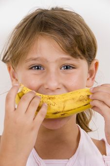 Little Girl Eating Banana Stock Photo Little Girl Eating Banana Stock Photo