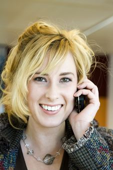 Young Blonde Caucasian Woman Answering Phone Royalty Free Stock Images Young Blonde Caucasian Woman Answering Phone Royalty Free Stock Images