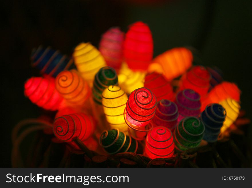 Many colorful objects in differently colors taken at night