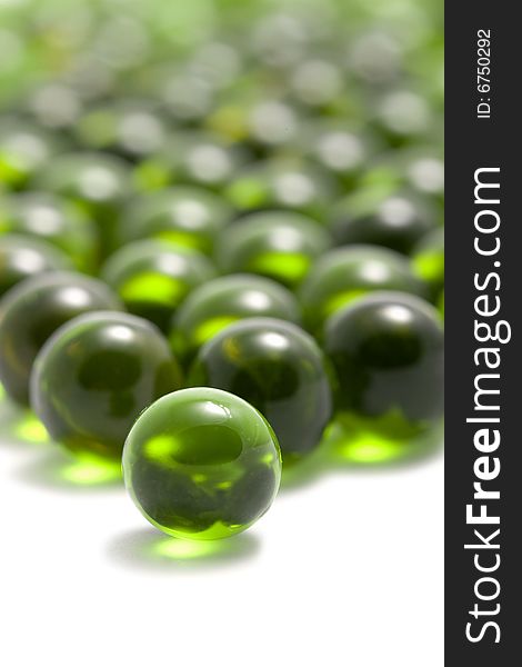 Macro of green capsule pills isolated