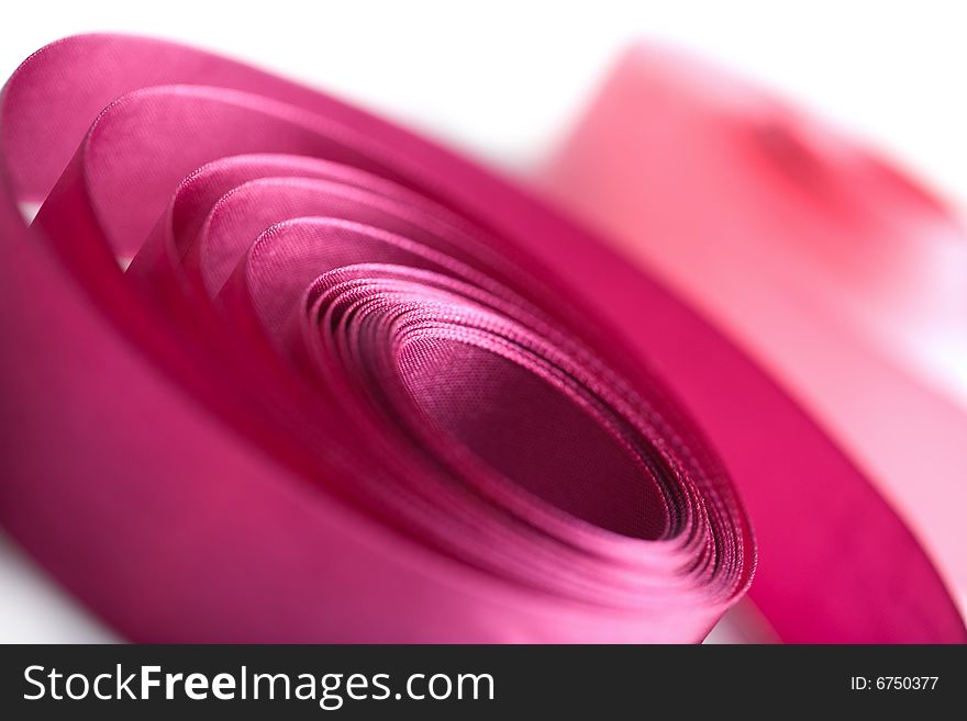 Beautiful pink ribbon in spiral form isolated. Beautiful pink ribbon in spiral form isolated