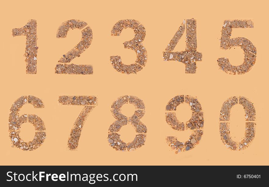 Stones and sands numerals isolation isolated on brown