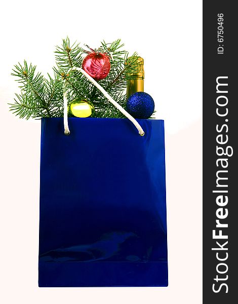 Christmas gifts in a package from a bright dark blue paper