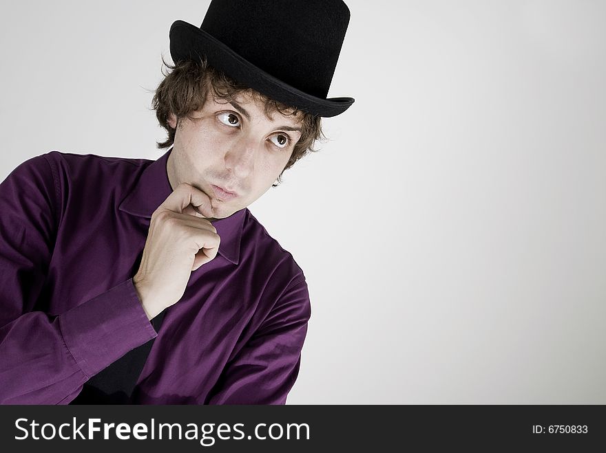 Elegant show man with purple shirt and top hat on white background. Elegant show man with purple shirt and top hat on white background