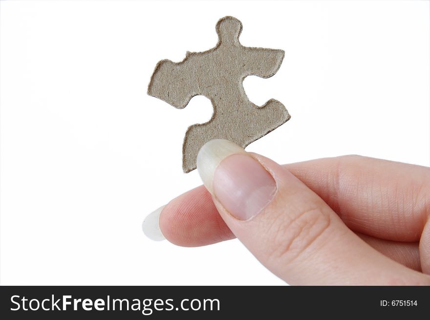 Jigsaw Piece in Hand