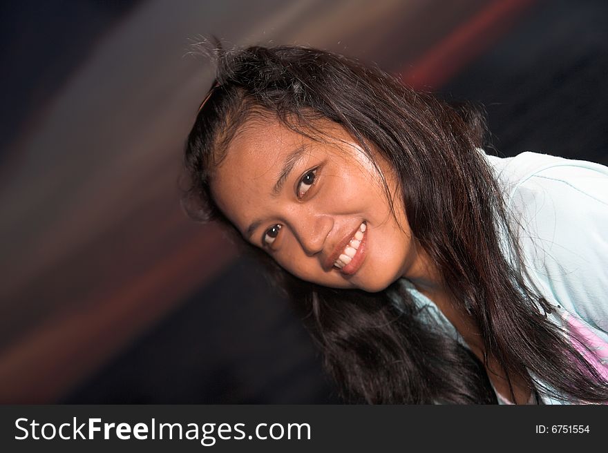 Photograph of sweet asian girl in evening