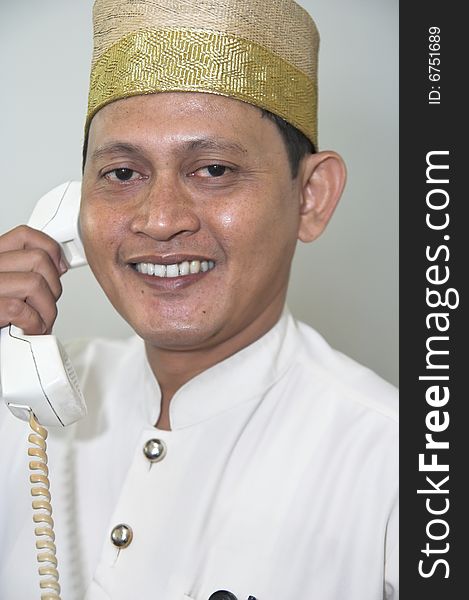Hotel staff calling and smiling. Hotel staff calling and smiling