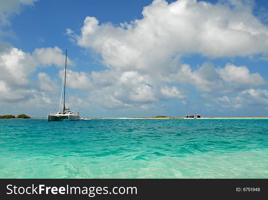 The yacht standing on an anchor in Caribbean sea, . The yacht standing on an anchor in Caribbean sea,