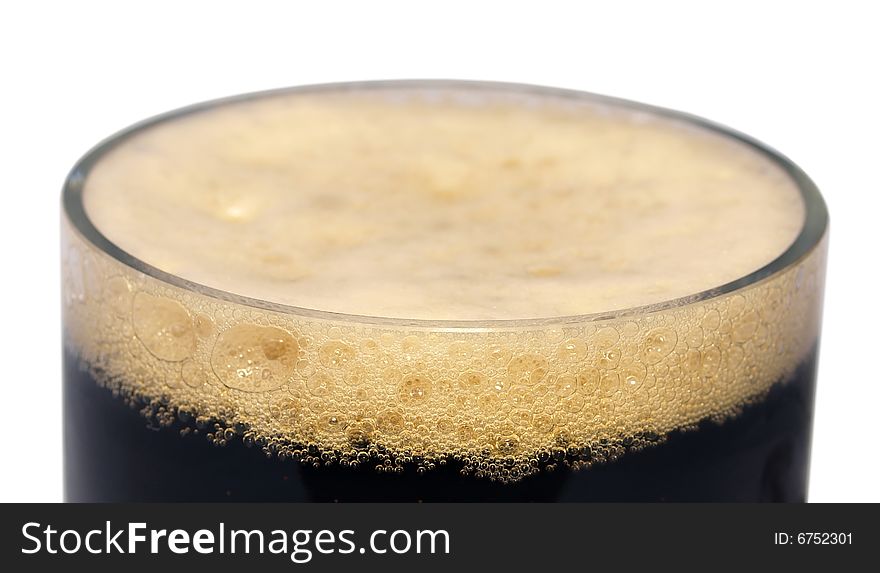 Close-up of Dark Beer foam on white