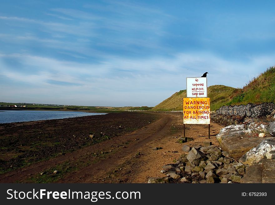 A warning sign for no swimming in kerry ireland. A warning sign for no swimming in kerry ireland