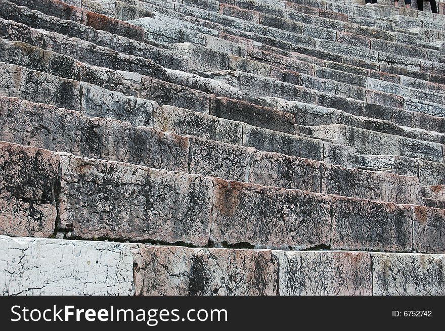 Old , gray,stone stairs from arena. Old , gray,stone stairs from arena