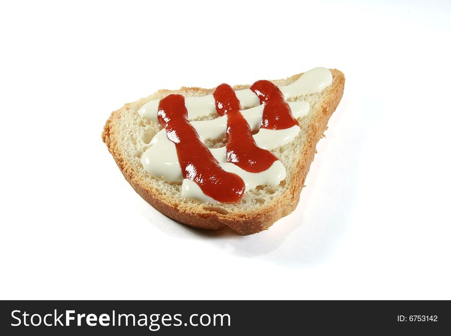 Bread with ketchup and sour cream. Bread with ketchup and sour cream