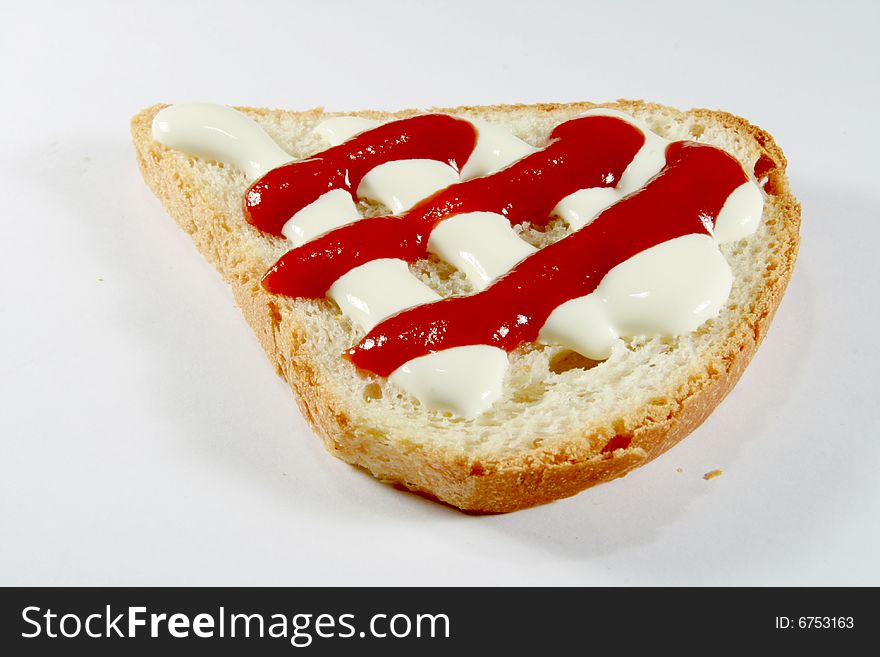 Bread with ketchup and sour cream. Bread with ketchup and sour cream