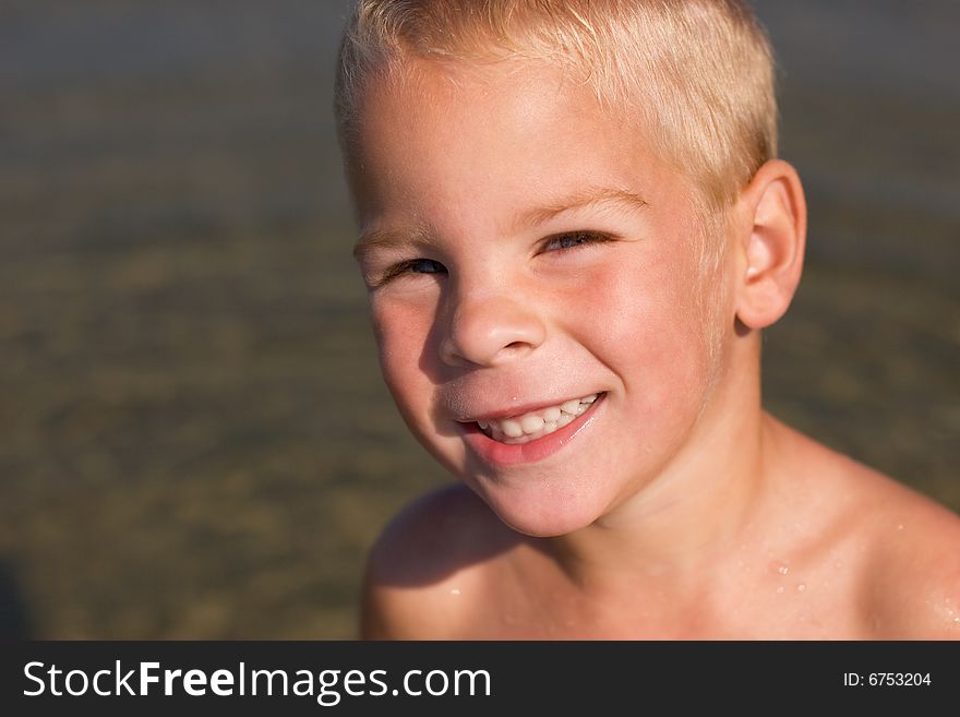 Young Boy At The Beach