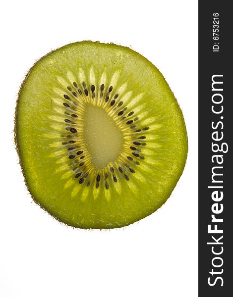 Closeup of a translucent slice of kiwi