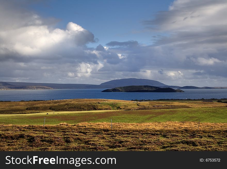 View to lake and middle-high mountains in Iceland. View to lake and middle-high mountains in Iceland