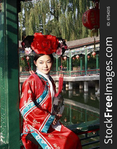 A beautiful girl in Chinese ancient dress is in the royal garden.

Chinese on the lantern is lucky and getting rich.

Chinese on the fan is meant and missed. A beautiful girl in Chinese ancient dress is in the royal garden.

Chinese on the lantern is lucky and getting rich.

Chinese on the fan is meant and missed.