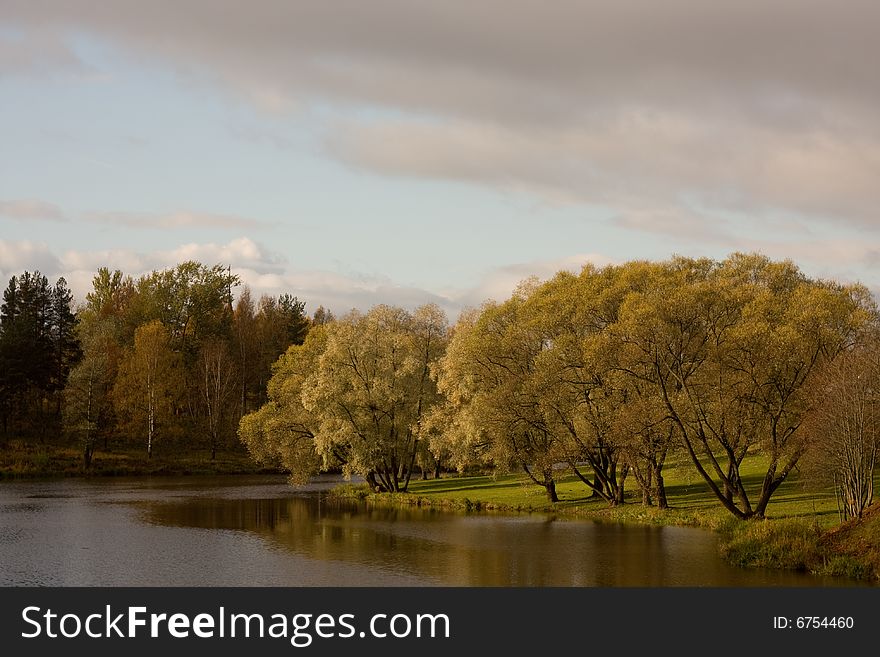 Autumnal pond in garden of the Pavlovck palace, Saint-Petersburg, Russia.