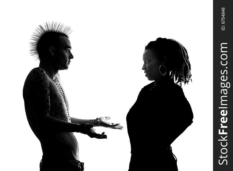 Man with Mohawk and Woman wearing Dreadlocks. Man with Mohawk and Woman wearing Dreadlocks