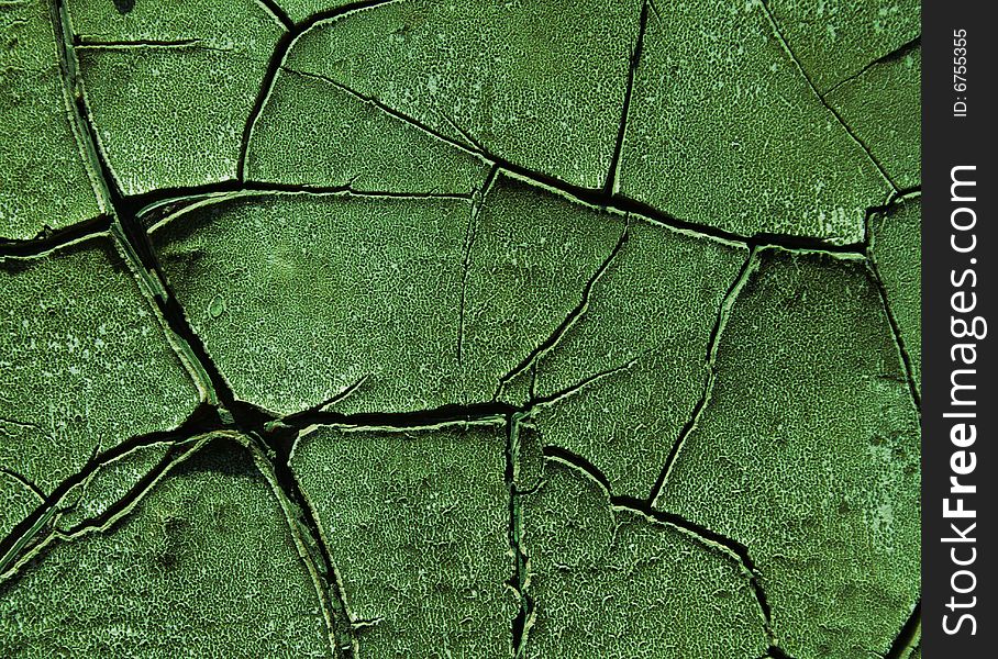 Green, cracked wall texture background. Green, cracked wall texture background.