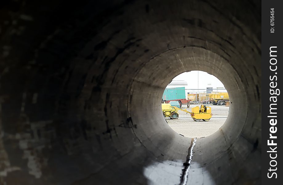 A road roller covered in a pipe