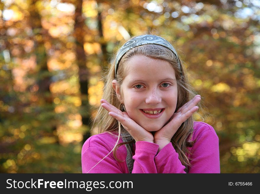 Happy girl in the autumn forest with colourful leaves. Happy girl in the autumn forest with colourful leaves