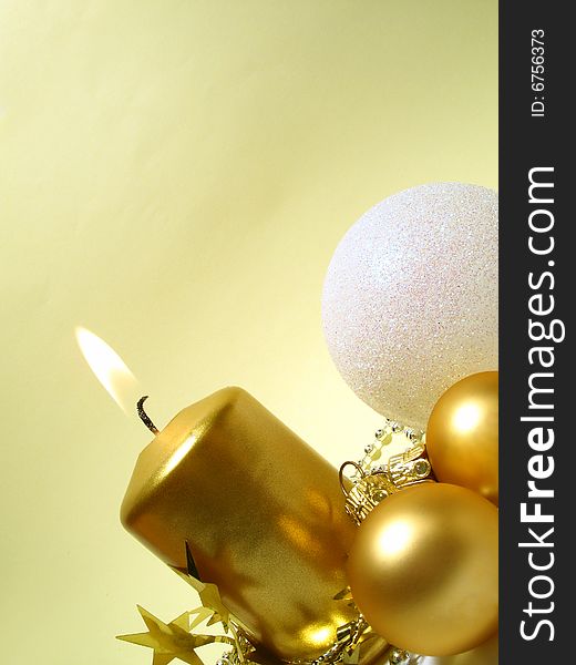 Christmas arrangement with gold candle and balls. Christmas arrangement with gold candle and balls