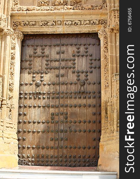 Antique door in Seville, Spain