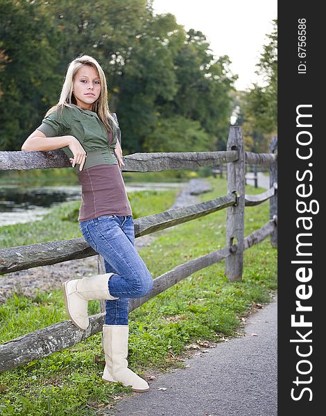 A beautiful blond teenage girl in the park. A beautiful blond teenage girl in the park