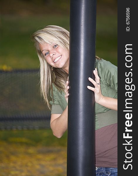 A beautiful blond teenage girl in the park. A beautiful blond teenage girl in the park