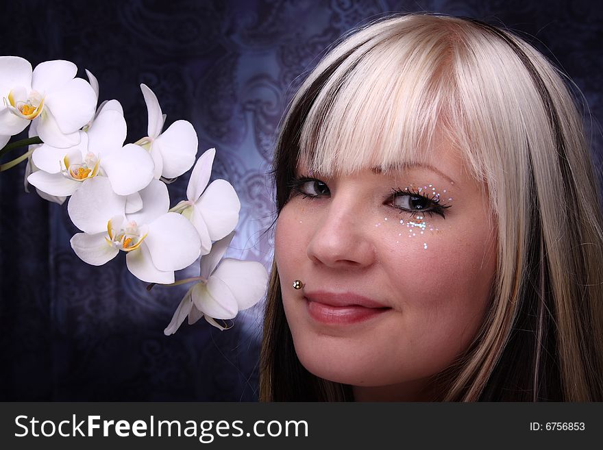 Beautiful young woman and white phalaenopsis orchid. Beautiful young woman and white phalaenopsis orchid
