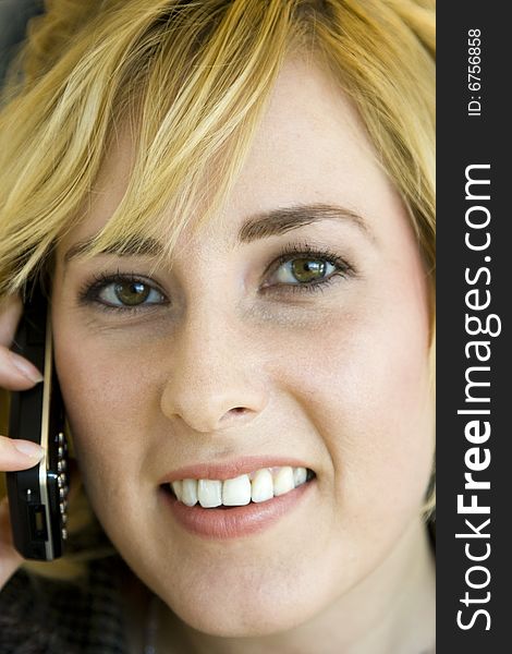 Young Blonde Caucasian Woman On Mobile Phone