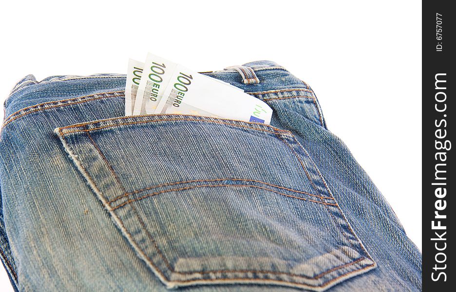 Bunch of Euro banknotes in the back pocket of a blue jeans.