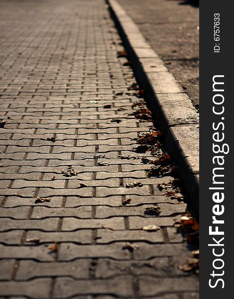 Lonely sidewalk on autumn afternoon. Lonely sidewalk on autumn afternoon