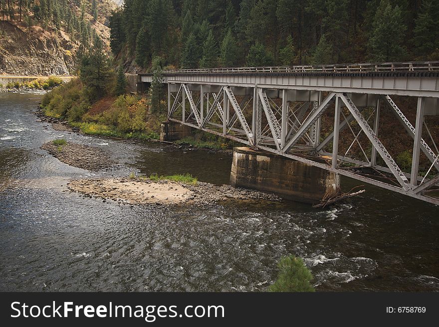 Iron Train Bridge Over Mountain River