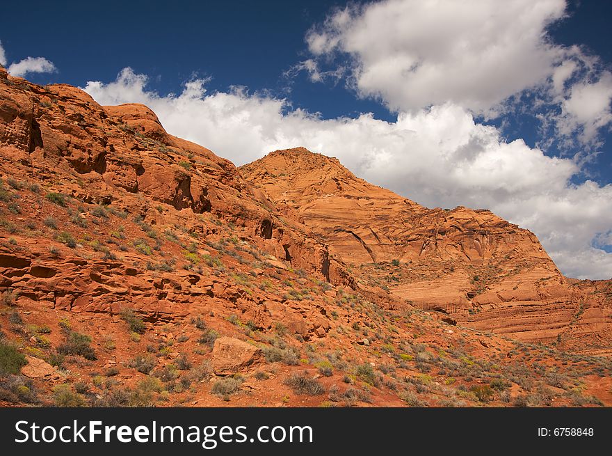 Red Rocks of Utah with Dramatic Blue Sky and Clouds