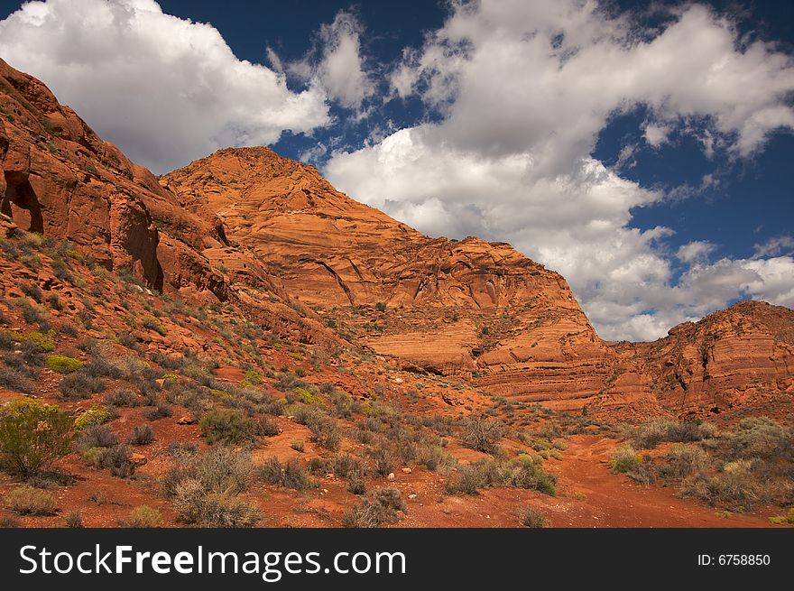 Red Rocks of Utah with Dramatic Blue Sky and Clouds