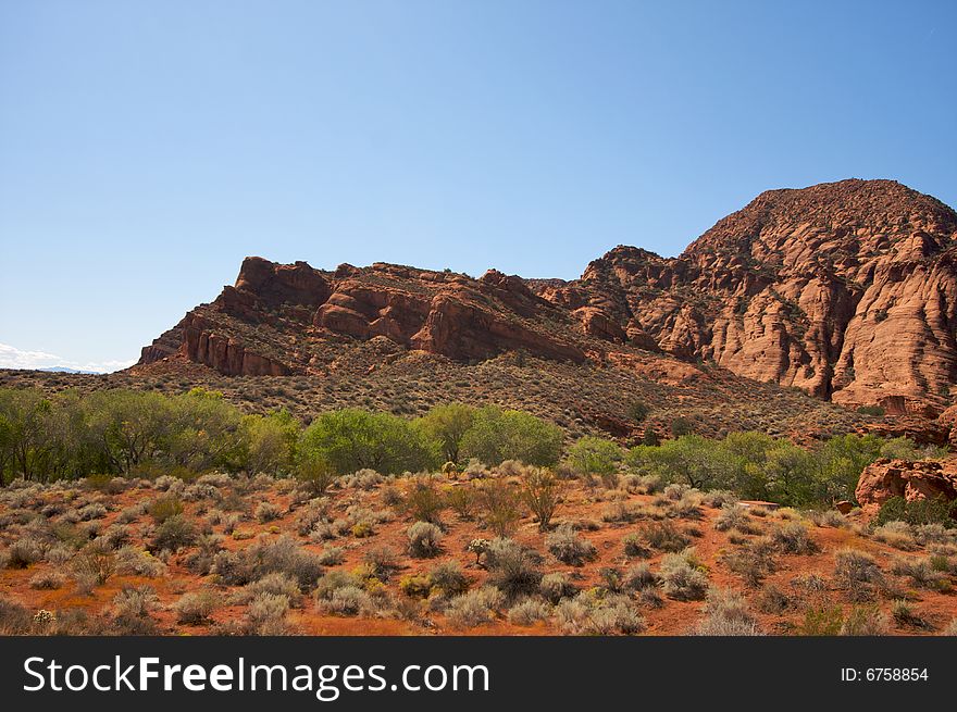 Red Rocks of Utah with Dramatic Blue Sky and Clouds