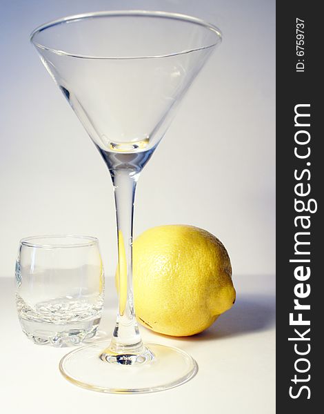 Abstract scene lemon and liquor-glasse. Abstract scene lemon and liquor-glasse