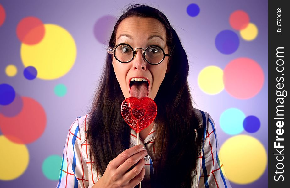 A young woman with lollipop